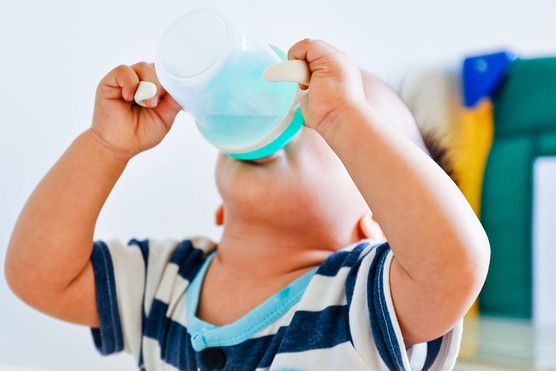 baby drinking from sippy cup