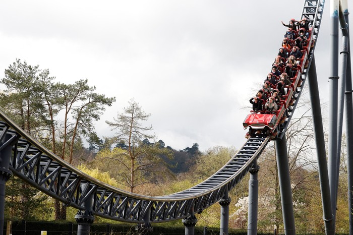 BRITAIN-HEALTH-VIRUS Members of the public ride on the Stealth ride at Thorpe Park theme park in Chertsey,