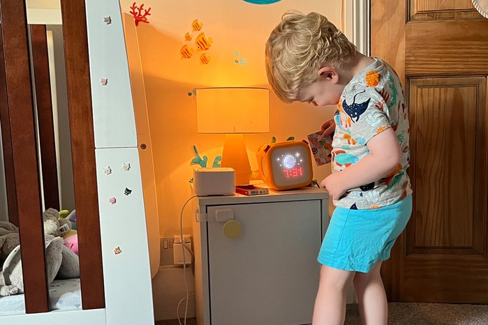 Yoto player being used by a toddler