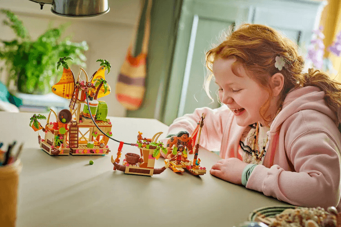 Kakamora Barge Child playing with Kakamora Barge LEGO set